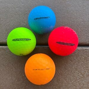 Golf balls.  2 Calloway’s and 2 Titleist. Used